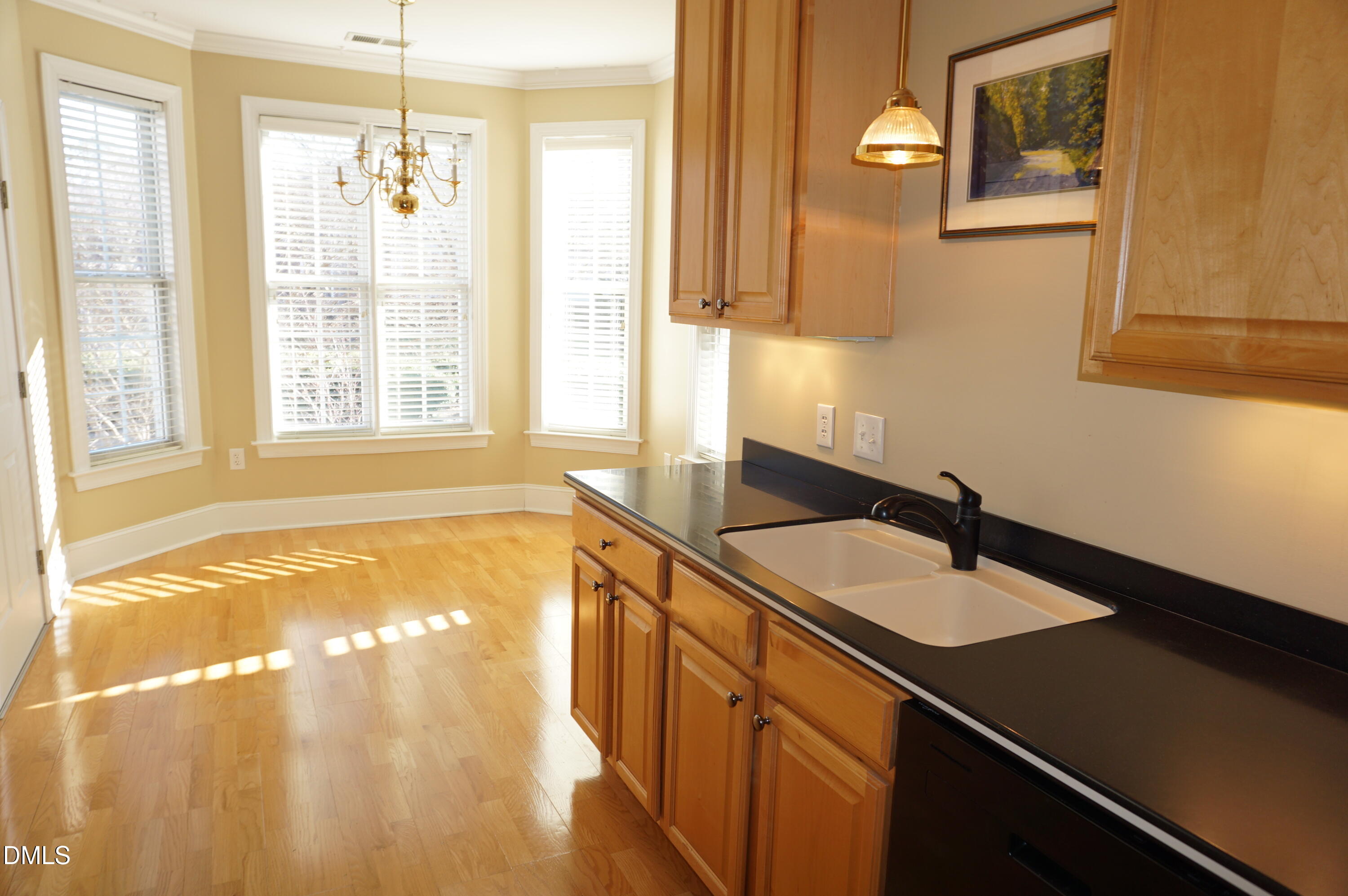 3701 Baron Cooper Pass, Unit 104 Raleigh, NC 27612 - Photo 30 of 52 a bathroom with a sink and a bathtub