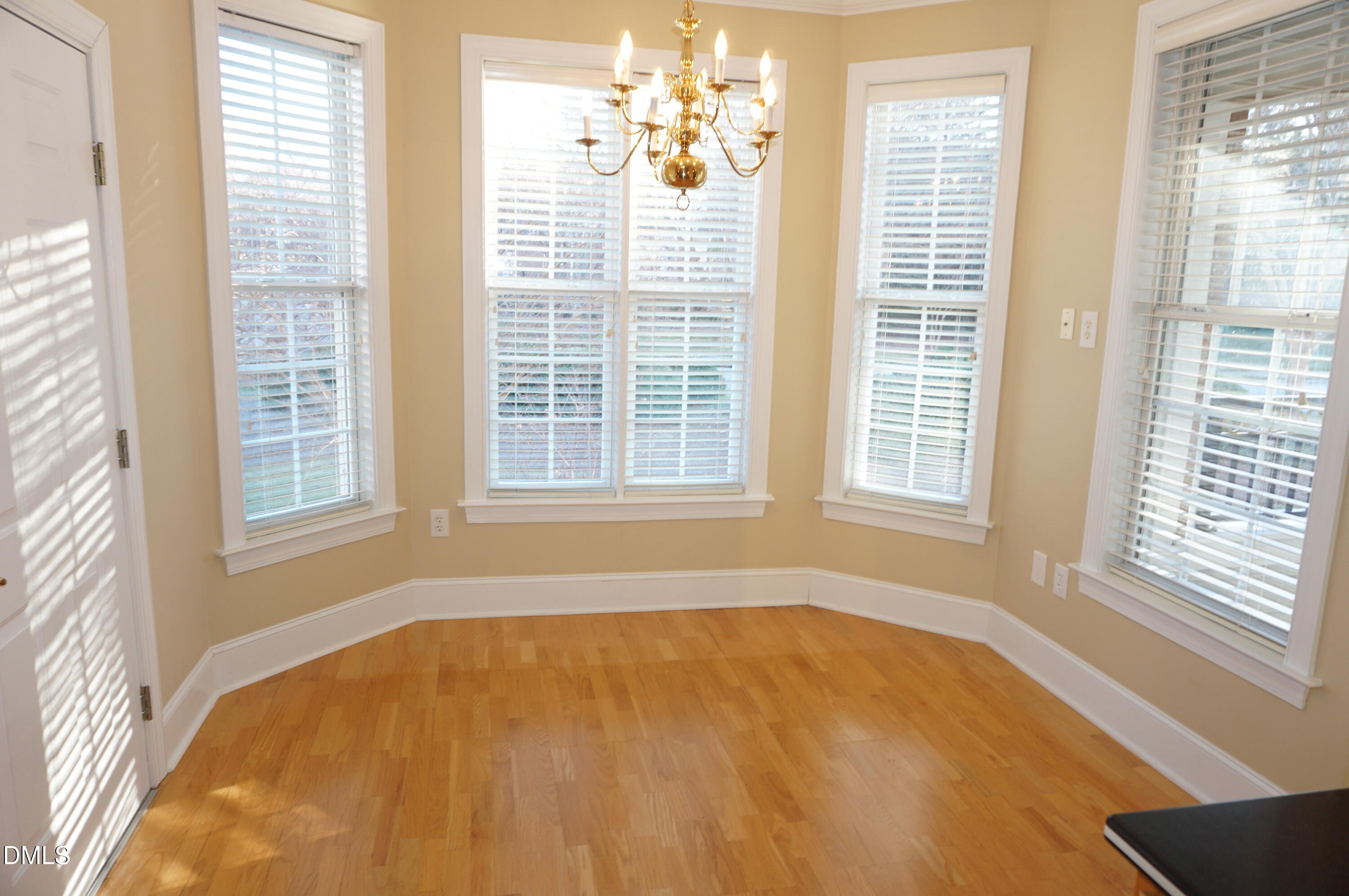3701 Baron Cooper Pass, Unit 104 Raleigh, NC 27612 - Photo 31 of 52 a view of an empty room with a window