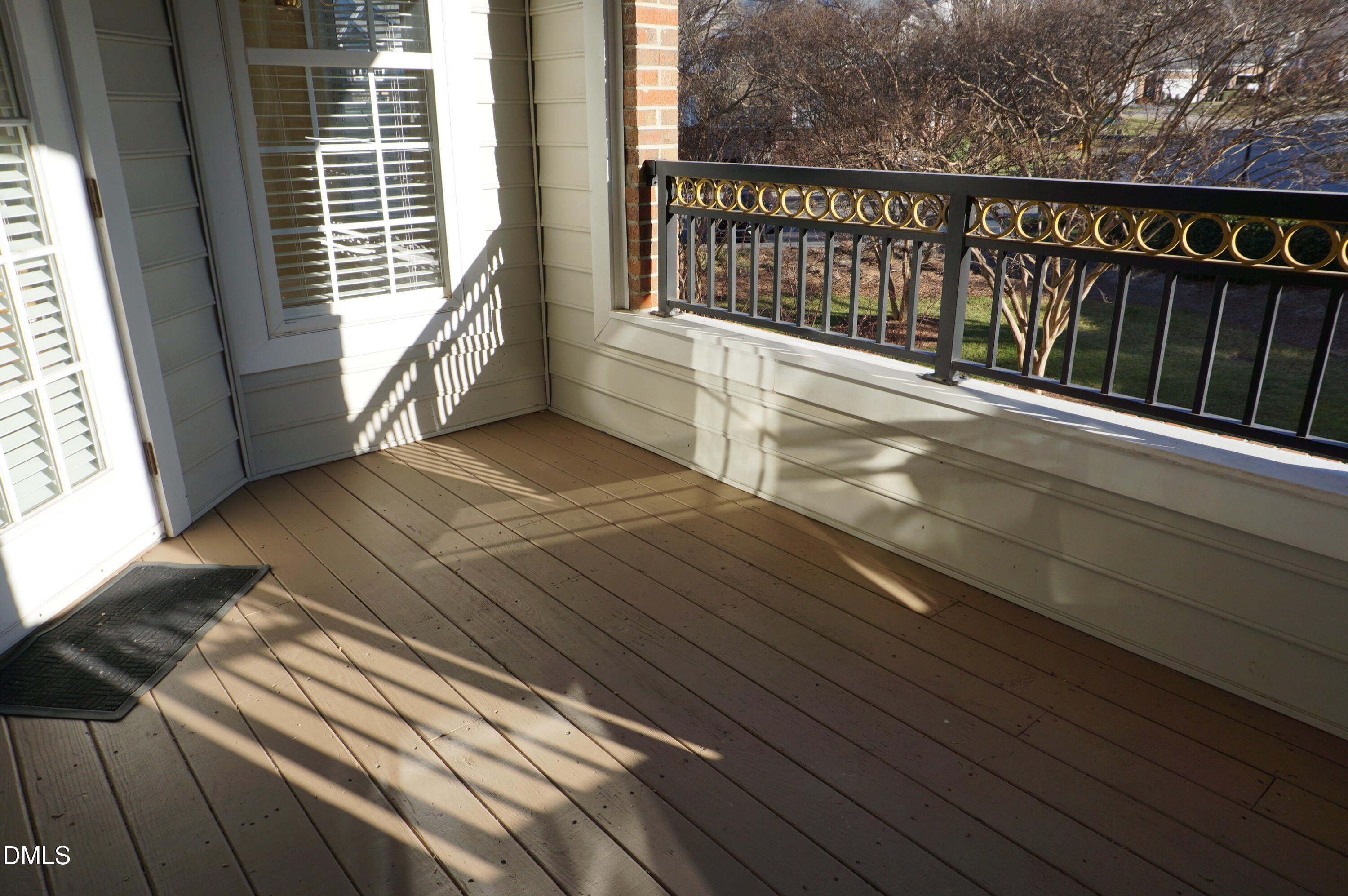 3701 Baron Cooper Pass, Unit 104 Raleigh, NC 27612 - Photo 46 of 52 a view of balcony with wooden floor