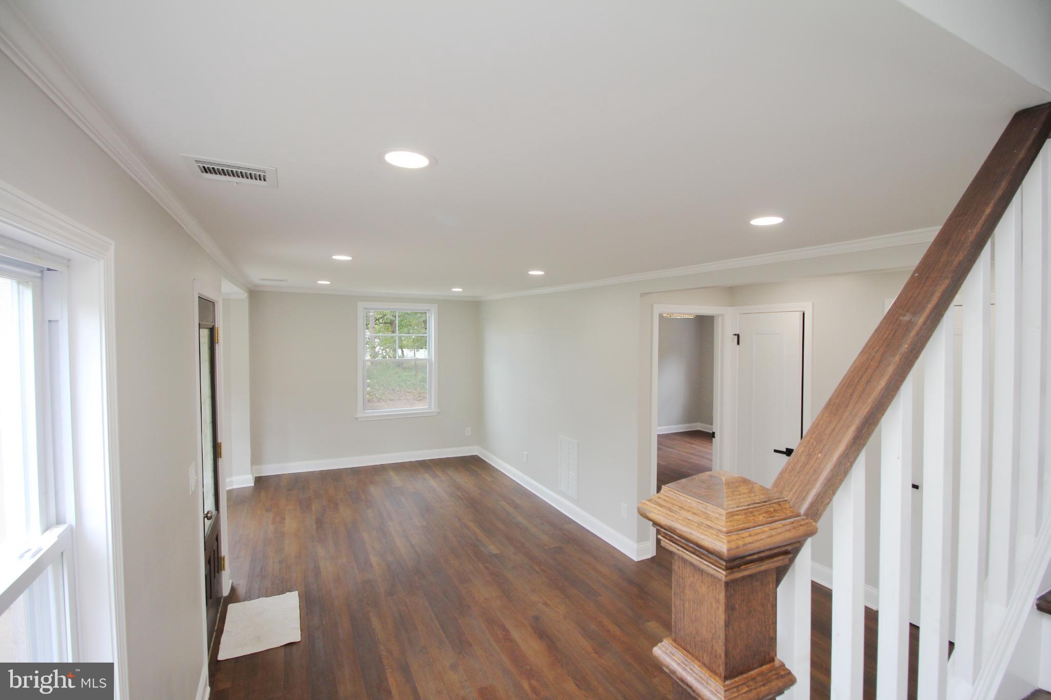 1588 Kearsley Road Sicklerville, NJ 08081 - Photo 17 of 36 a view of an entryway with wooden floor