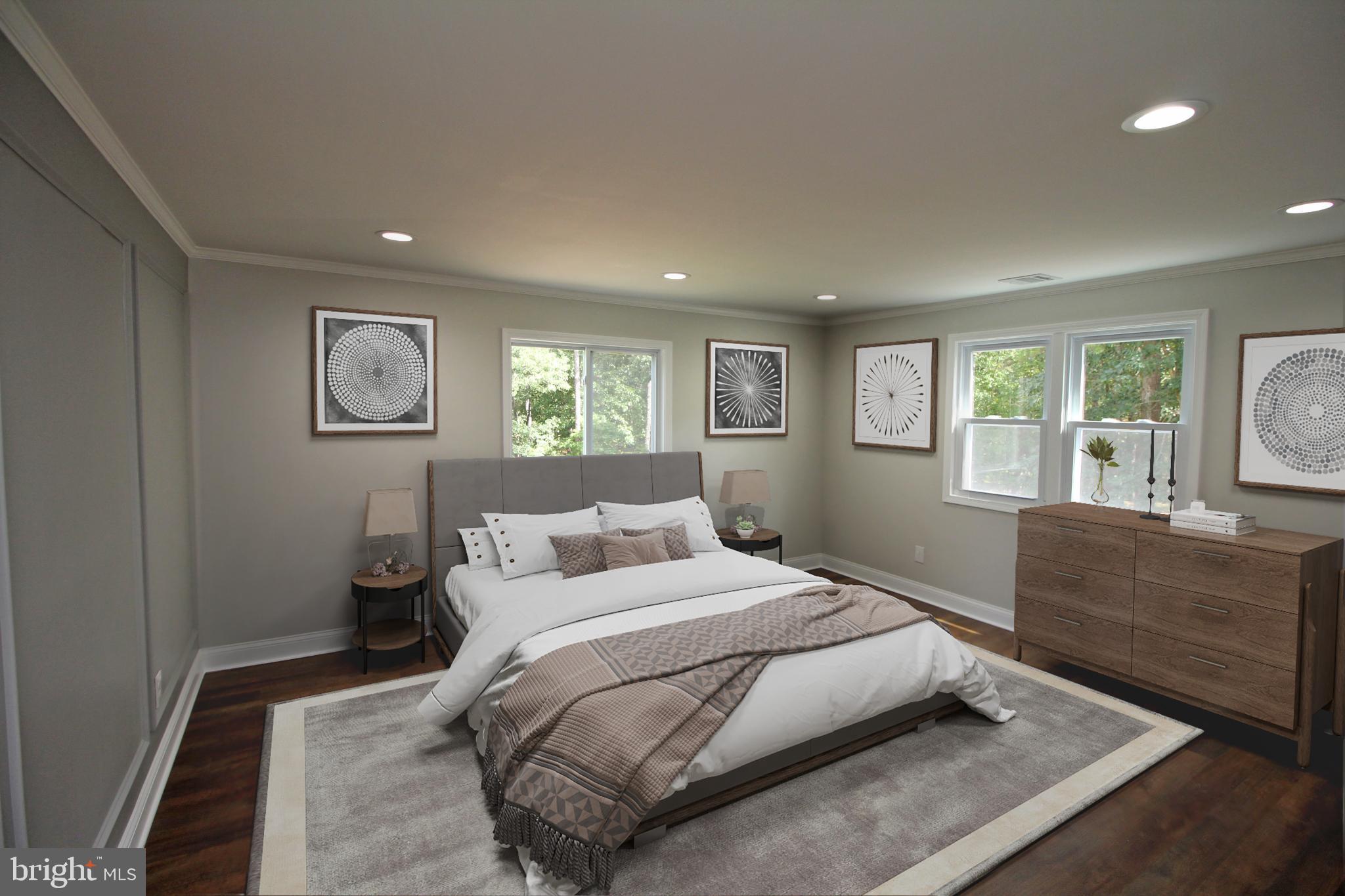 1588 Kearsley Road Sicklerville, NJ 08081 - Photo 18 of 36 a bedroom with a large bed and a window