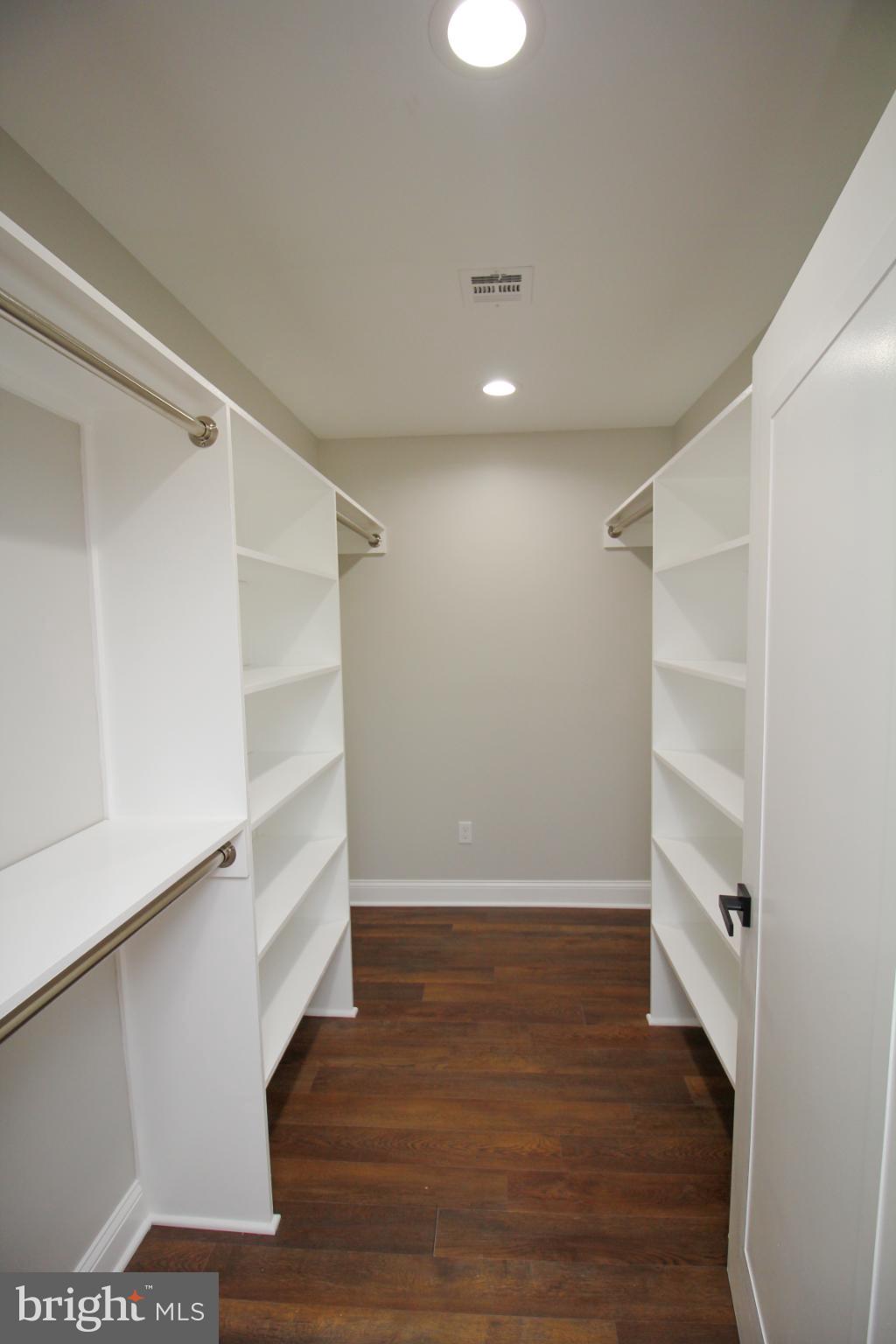 1588 Kearsley Road Sicklerville, NJ 08081 - Photo 21 of 36 a view of walk in closet with wooden floors