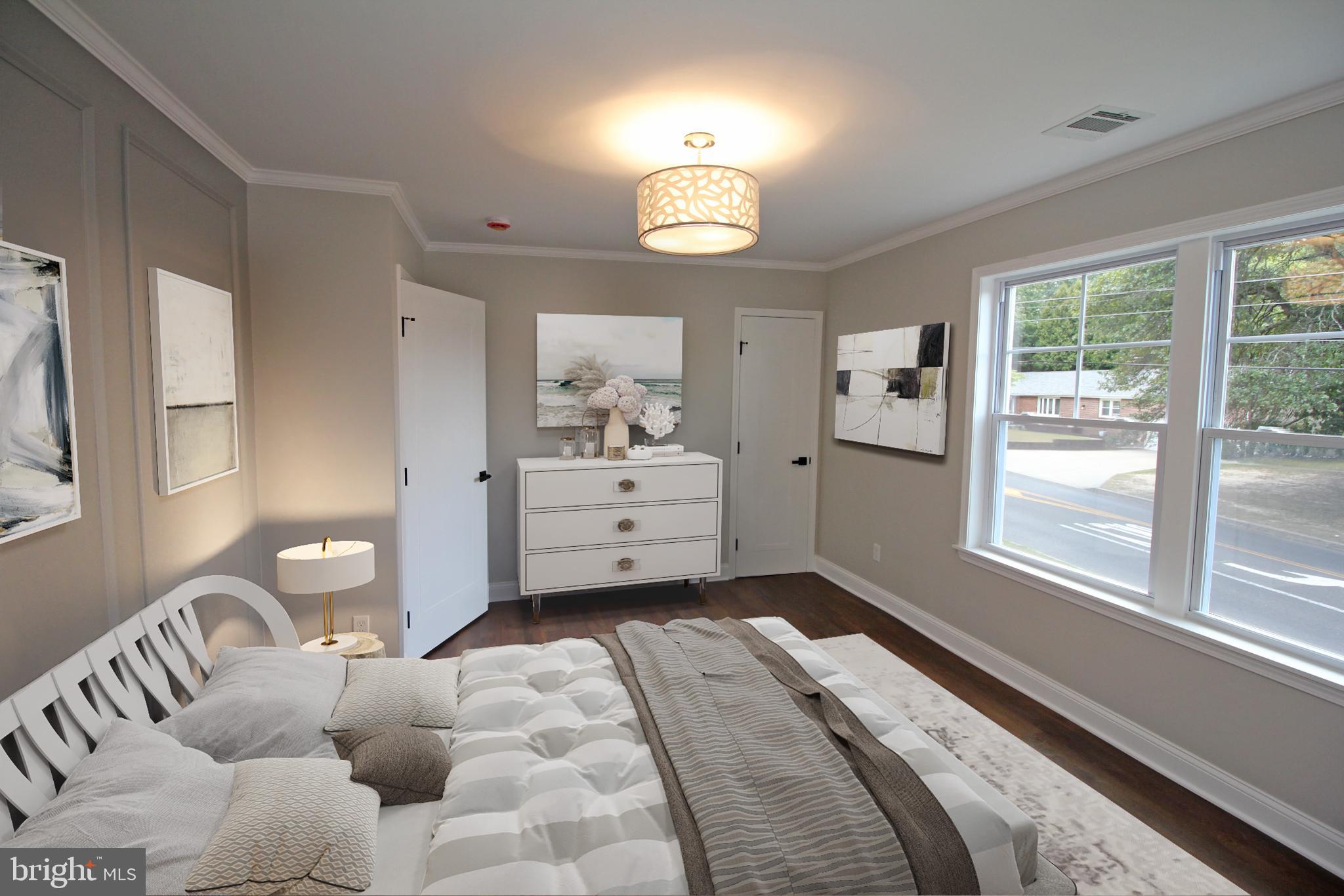 1588 Kearsley Road Sicklerville, NJ 08081 - Photo 29 of 36 a spacious bedroom with a bed and a window