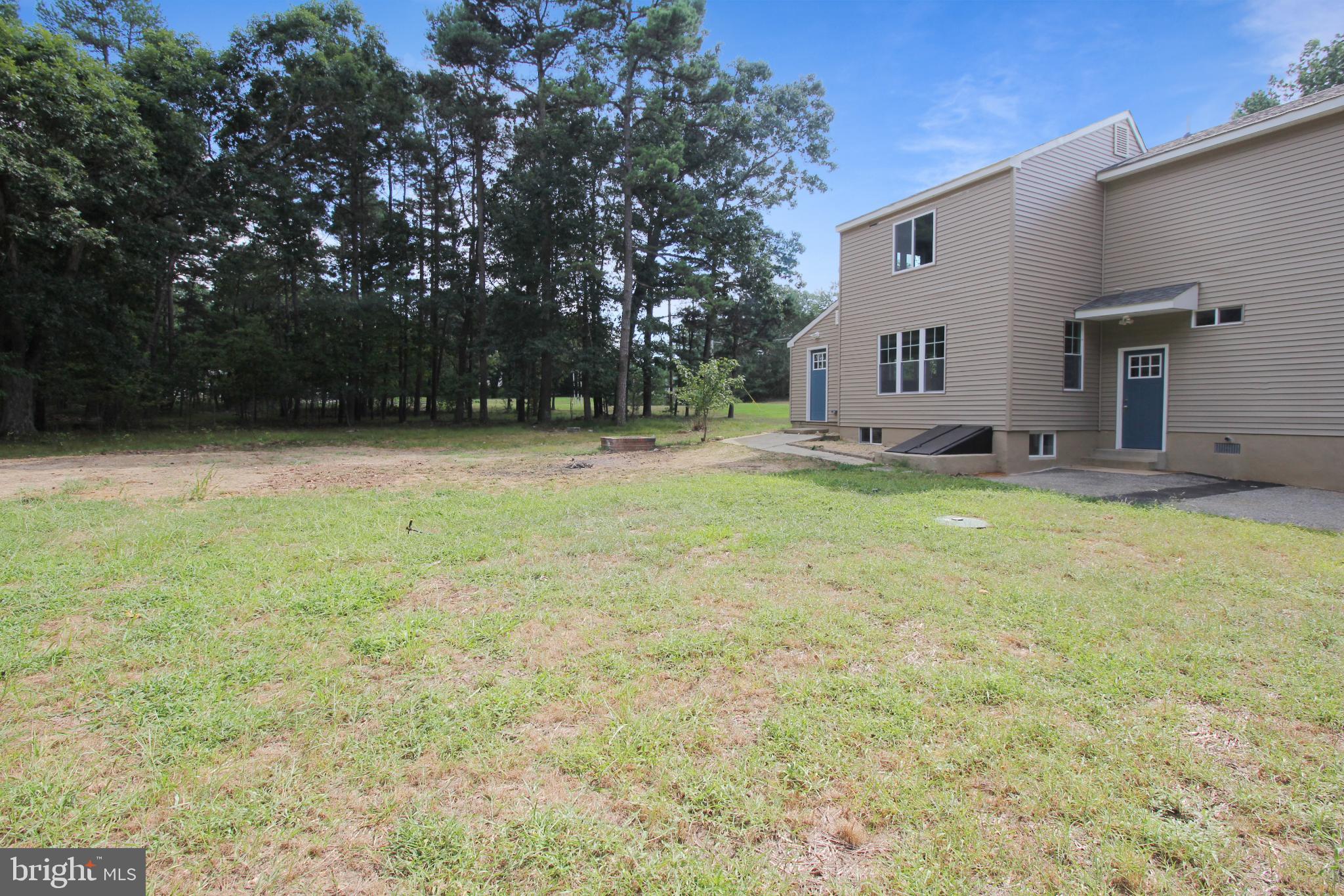 1588 Kearsley Road Sicklerville, NJ 08081 - Photo 4 of 36 a view of a house with a yard