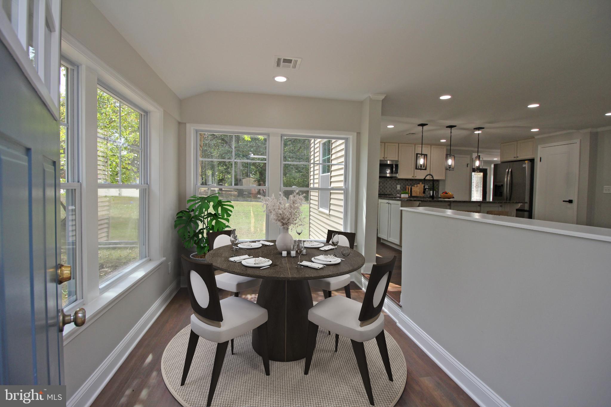 1588 Kearsley Road Sicklerville, NJ 08081 - Photo 7 of 36 a dining room with furniture and a floor to ceiling window