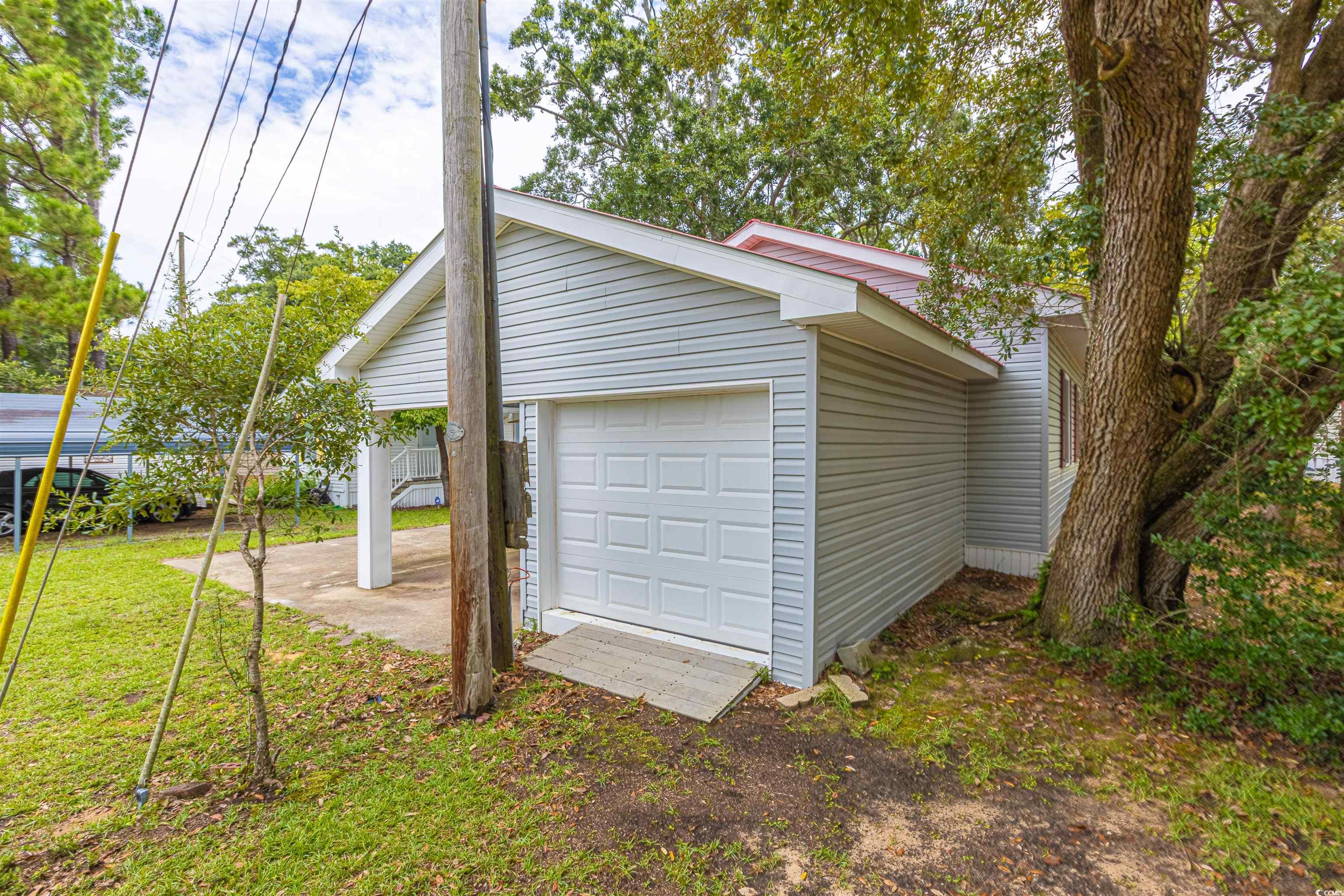517 Porter Drive Murrells Inlet, SC 29576 - Photo 11 of 40 View of garage