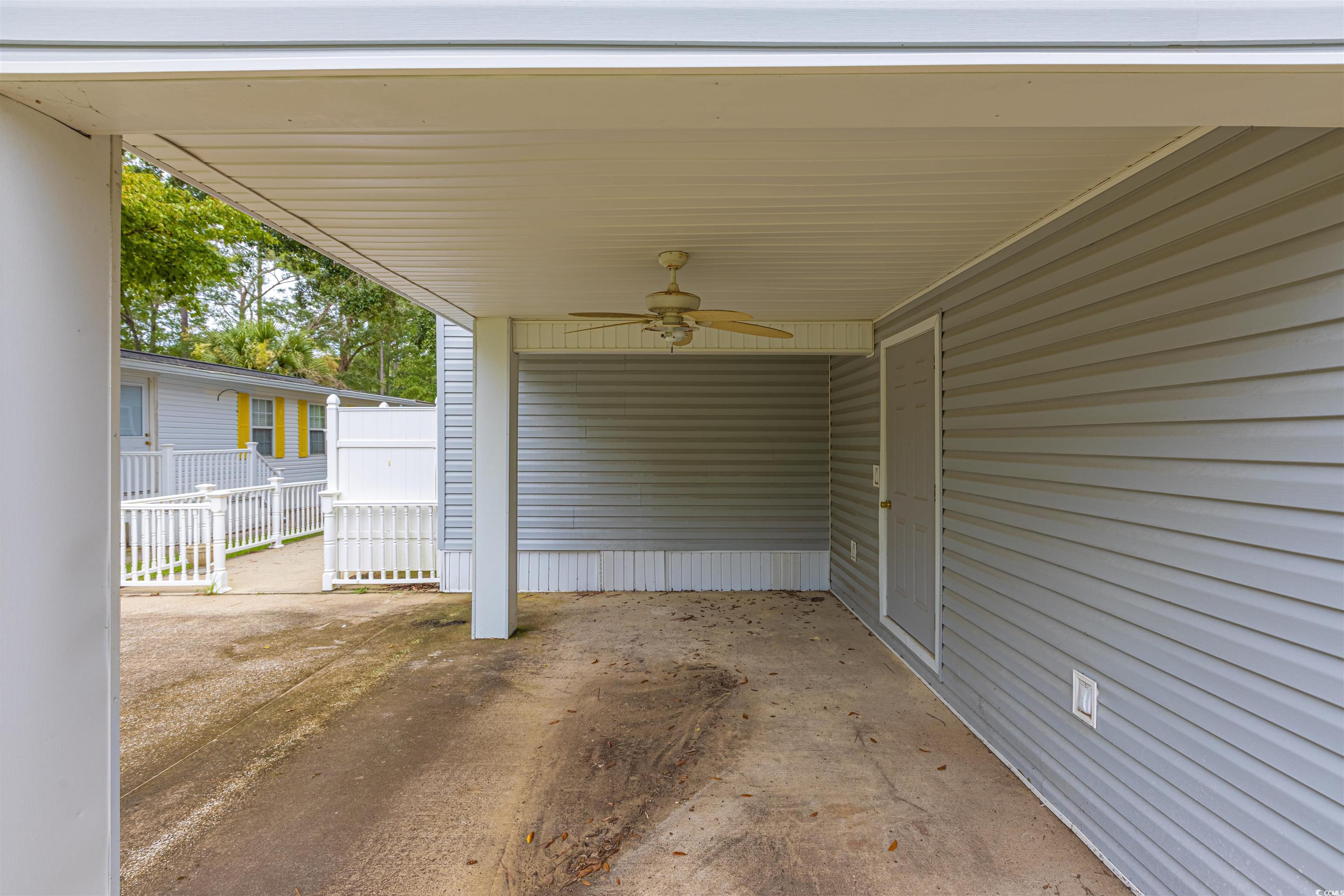 517 Porter Drive Murrells Inlet, SC 29576 - Photo 12 of 40 View of patio / terrace featuring ceiling fan and an attached carport