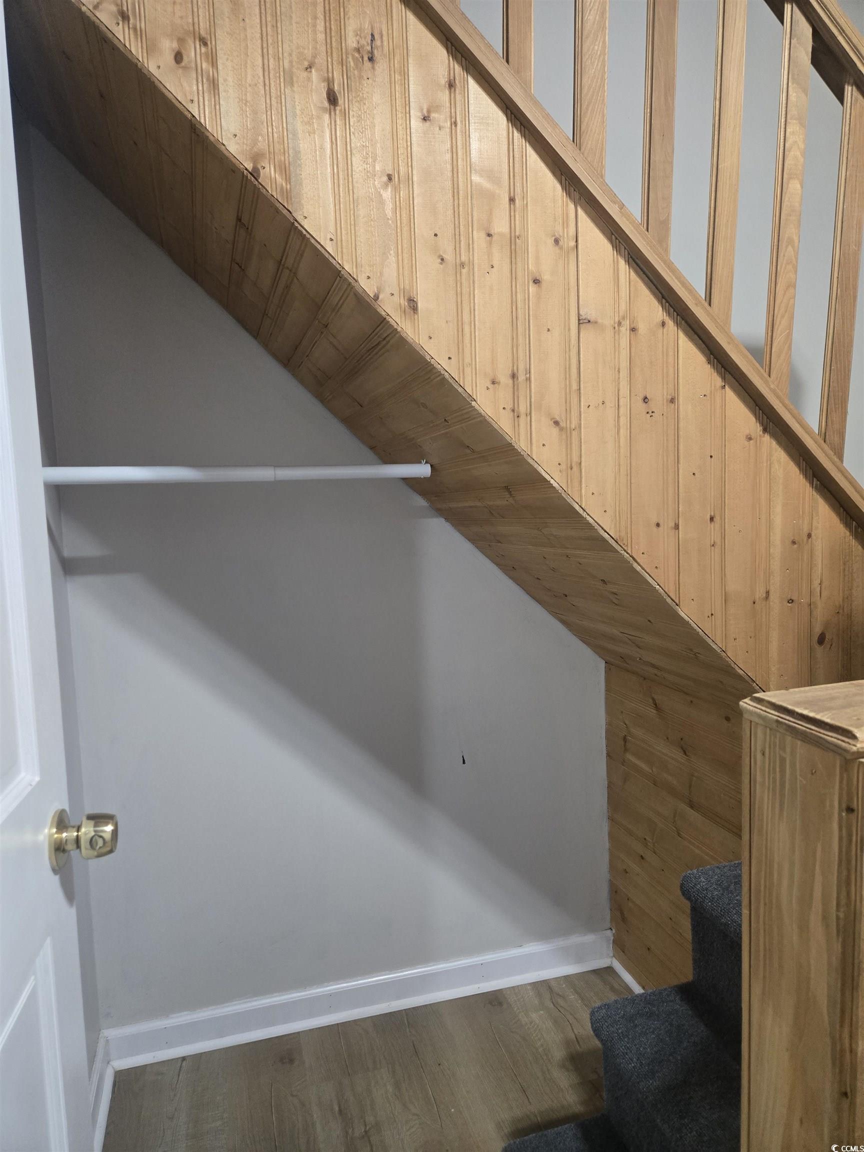 517 Porter Drive Murrells Inlet, SC 29576 - Photo 18 of 40 Stairway with wood finished floors and baseboards