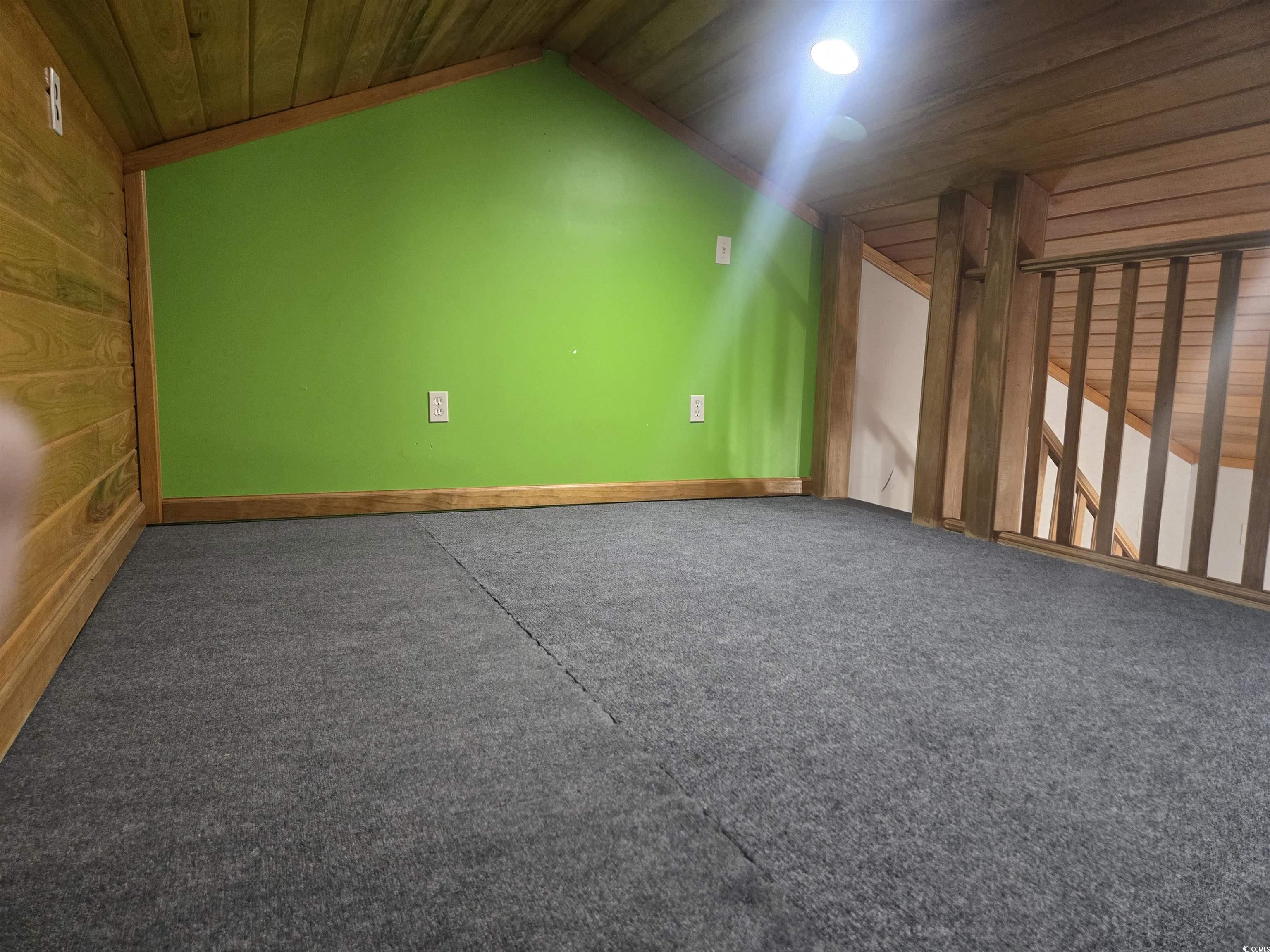 517 Porter Drive Murrells Inlet, SC 29576 - Photo 21 of 40 Bonus room featuring vaulted ceiling, carpet flooring, and wooden ceiling