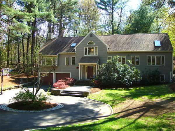 6 Valley View Road Weston, MA 02493 - Photo 1 of 28 a front view of a house with a yard