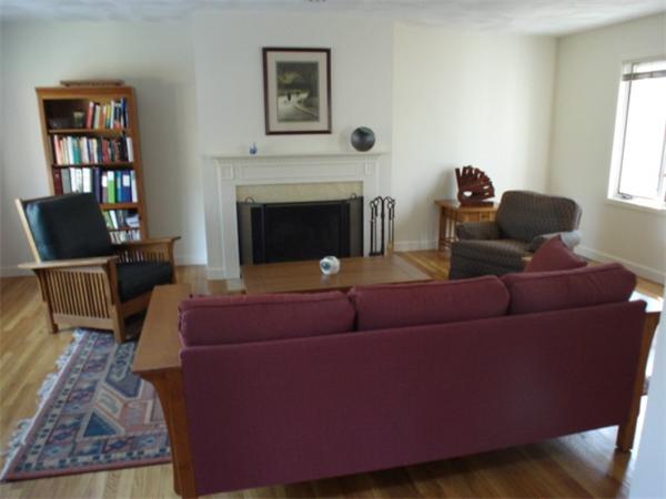 6 Valley View Road Weston, MA 02493 - Photo 6 of 28 a living room with furniture and a fireplace