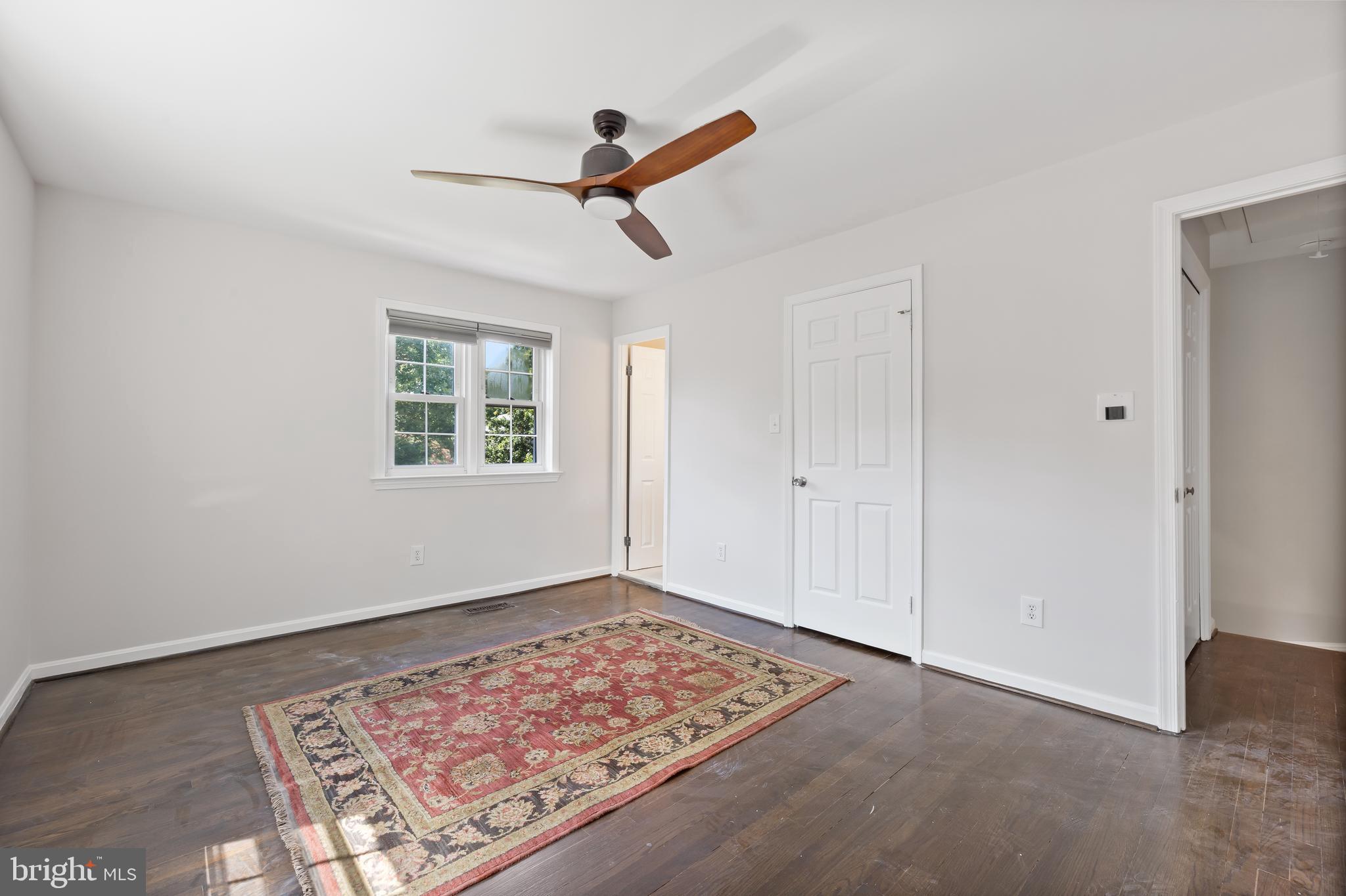 6721 Kenwood Forest Lane, Unit 45 Chevy Chase, MD 20815 - Photo 16 of 35 a view of an empty room with a window