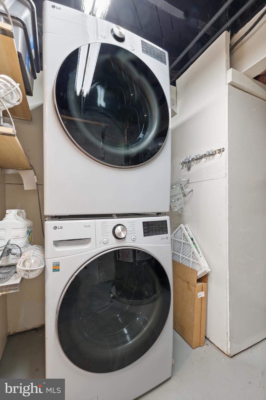 6721 Kenwood Forest Lane, Unit 45 Chevy Chase, MD 20815 - Photo 29 of 35 a utility room with dryer and washer