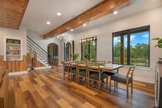 a living room with furniture and a table