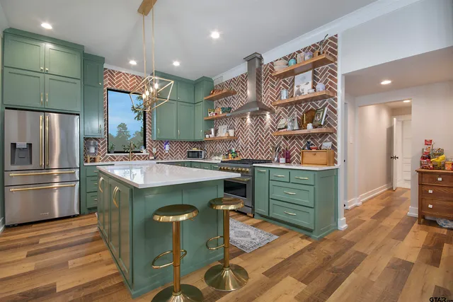 a living room with furniture and a rug