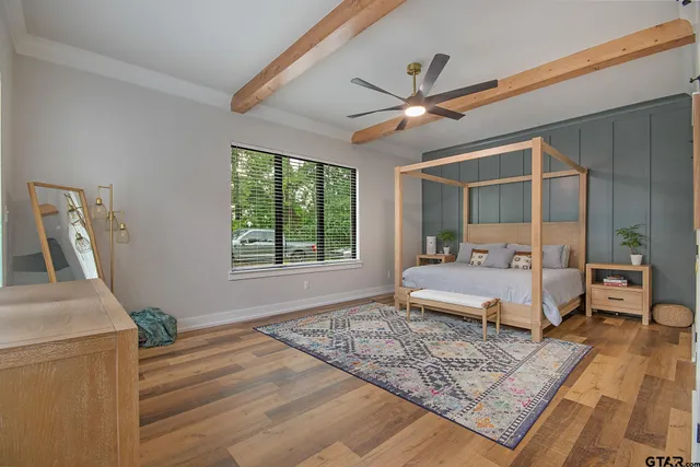 a room with lots of different colored cloths