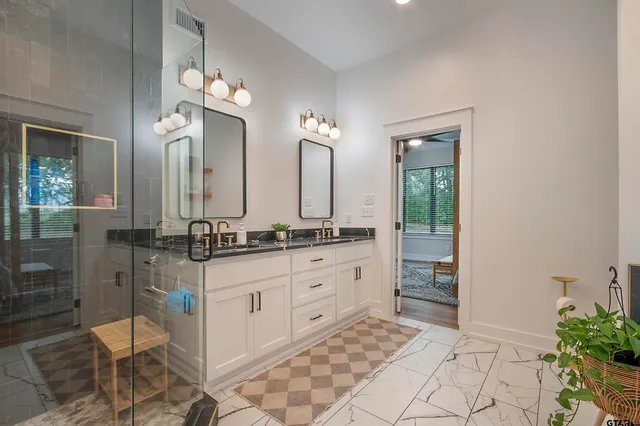 a living room with furniture and a rug
