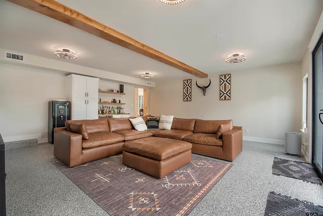 a view of a room with porch and a yard