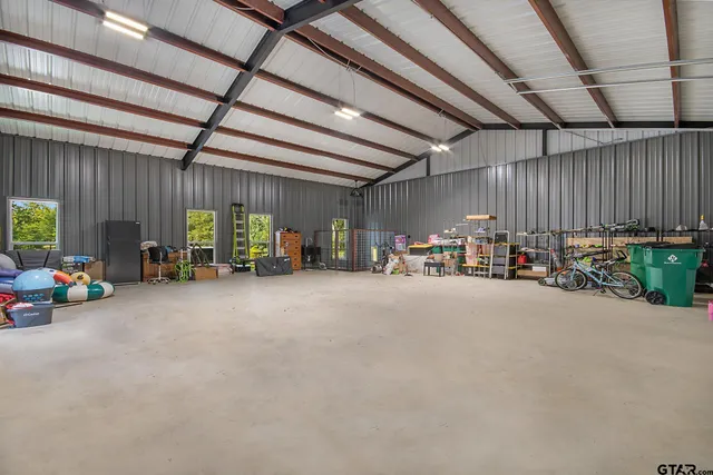 a view of a swimming pool with a lounge chair