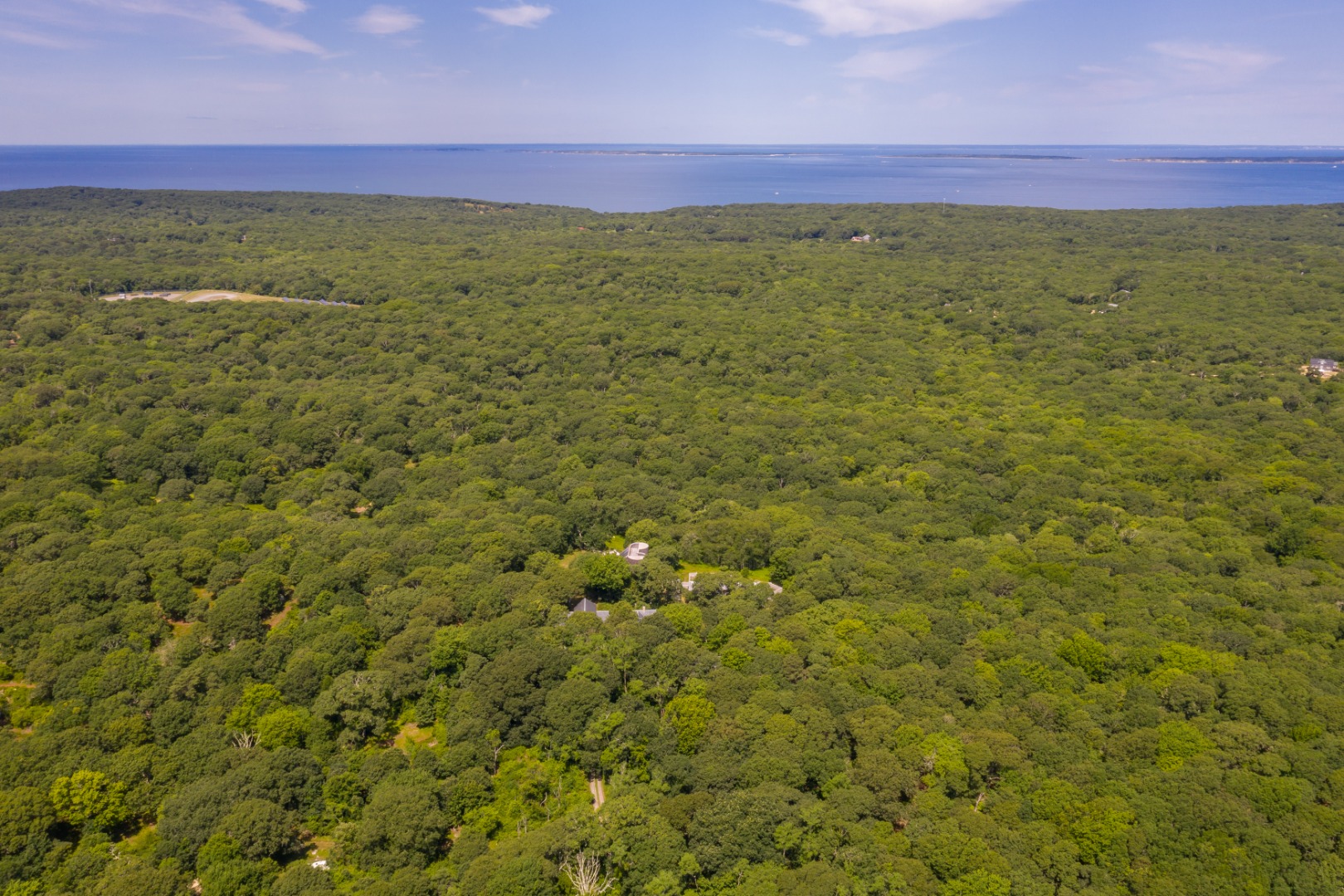 34 Ebens Lane Chilmark, MA 02535 - Photo 2 of 4 a view of a field with an ocean