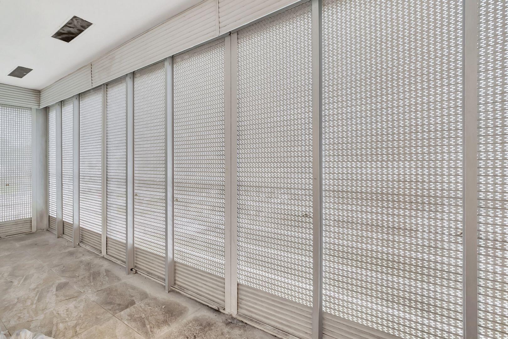 113 Fanshaw C Boca Raton, FL 33434 - Photo 19 of 45 Screened Patio w/Pull Downs