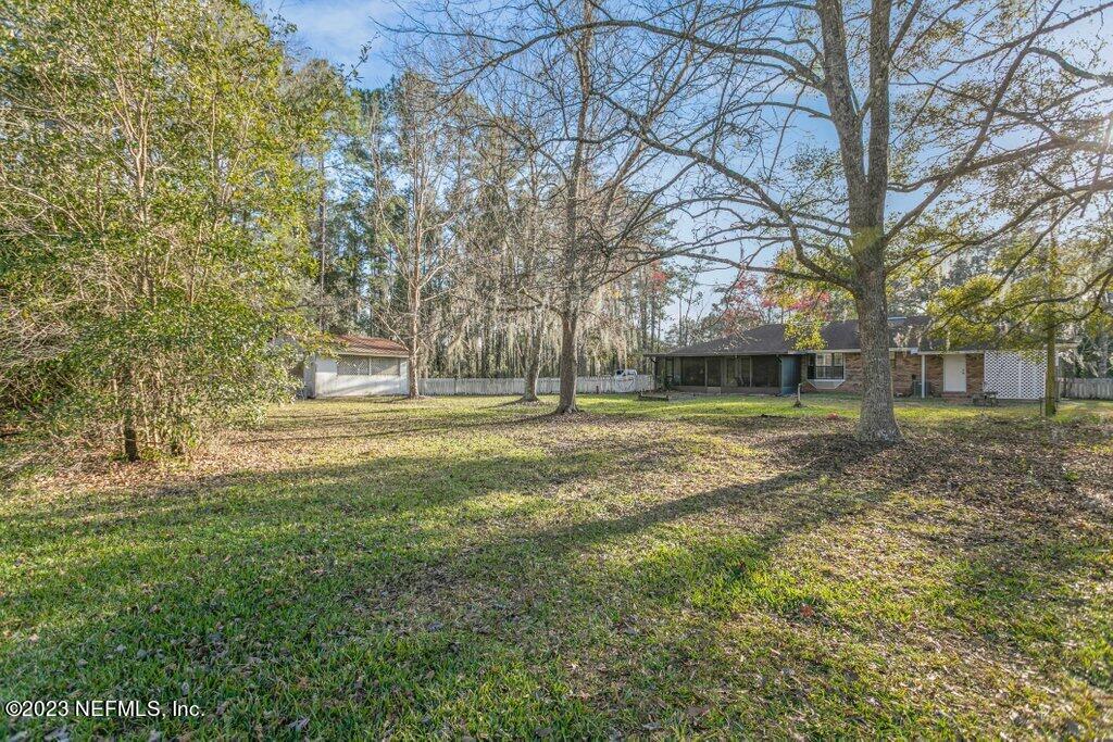 1271 Sheffield Road Jacksonville, FL 32259 - Photo 17 of 19 a view of a house with a yard