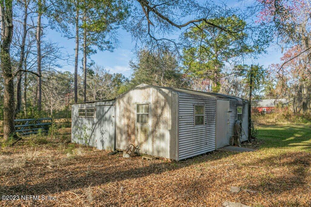 1271 Sheffield Road Jacksonville, FL 32259 - Photo 18 of 19 a view of backyard and tree