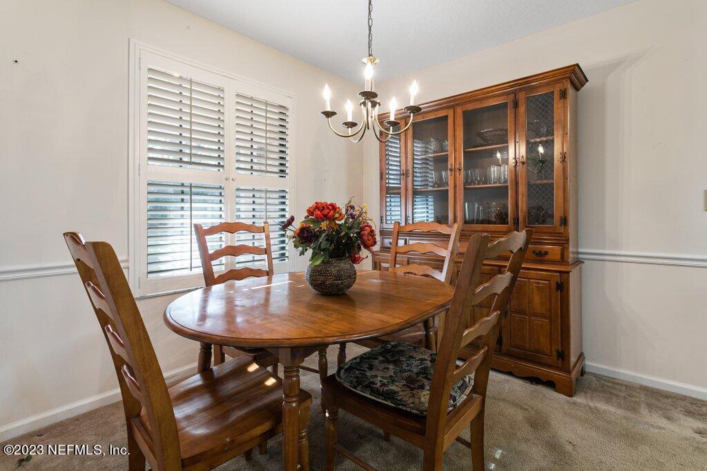1271 Sheffield Road Jacksonville, FL 32259 - Photo 9 of 19 a view of a dining room with furniture and window
