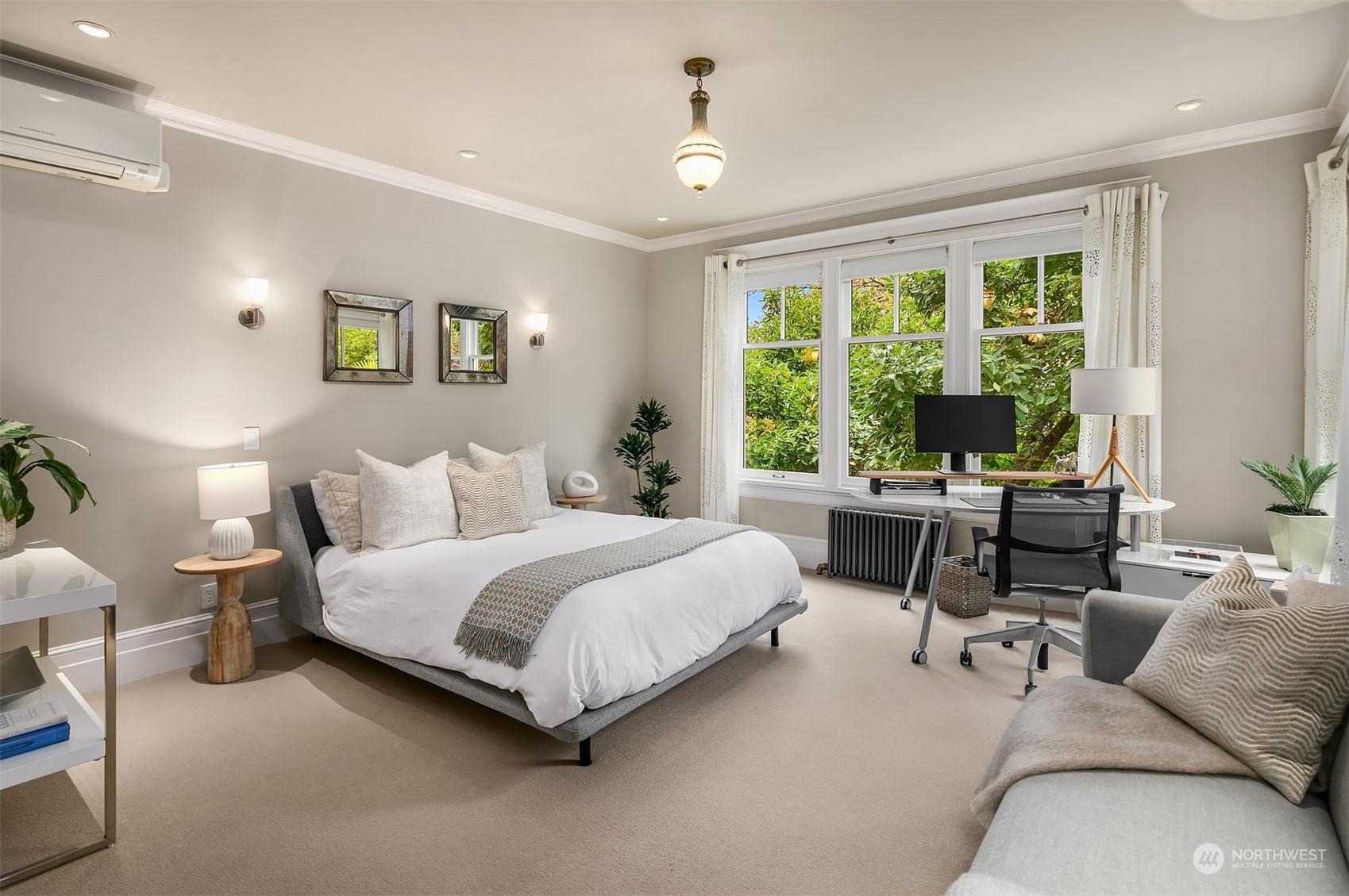 1121 22nd Avenue East Seattle, WA 98112 - Photo 21 of 40 a bedroom with a bed and a couch