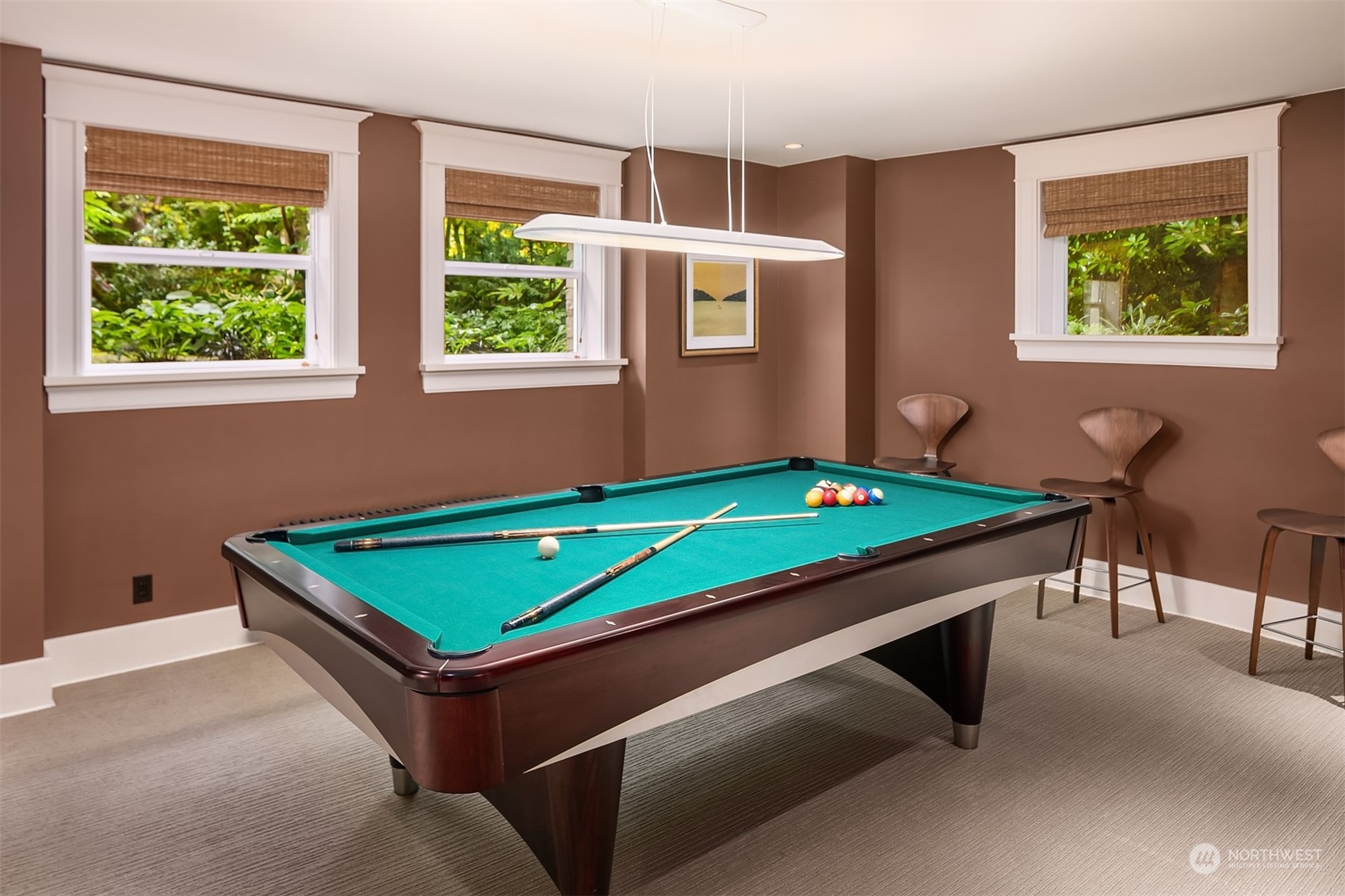 1121 22nd Avenue East Seattle, WA 98112 - Photo 28 of 40 a room with pool table and windows