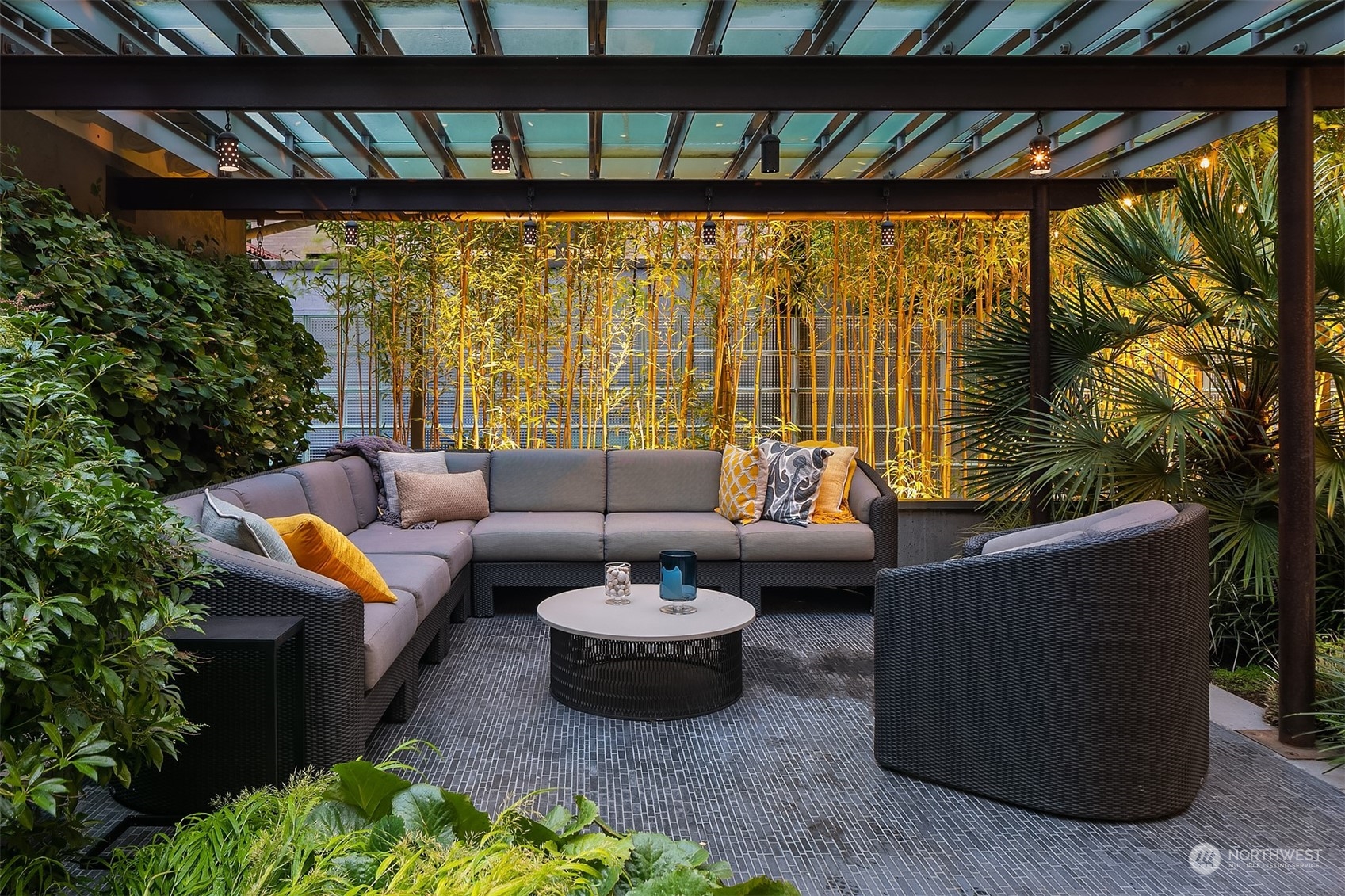 1121 22nd Avenue East Seattle, WA 98112 - Photo 33 of 40 a living room with patio furniture and a potted plants