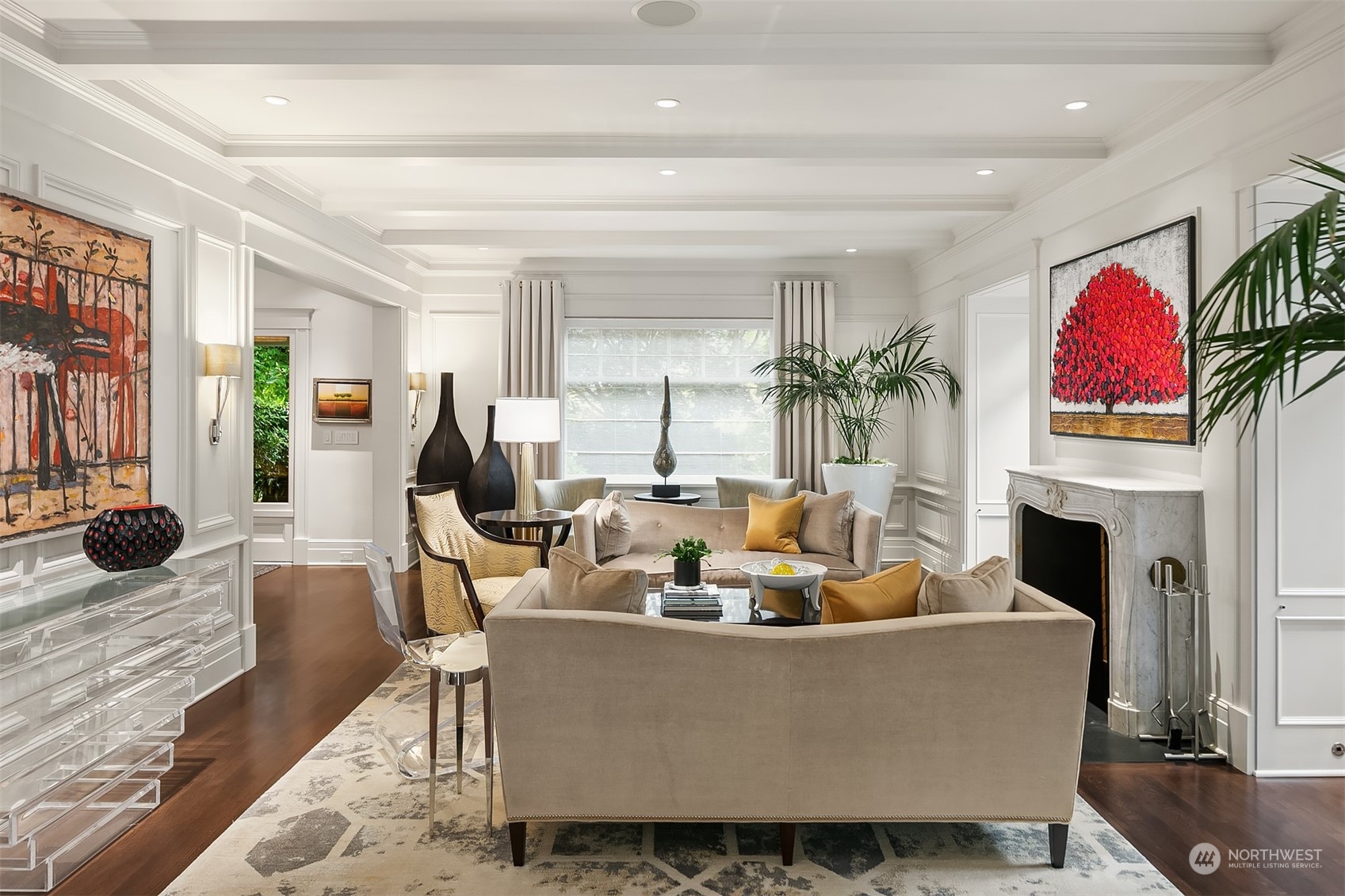 1121 22nd Avenue East Seattle, WA 98112 - Photo 4 of 40 a living room with furniture a fireplace and a potted plant