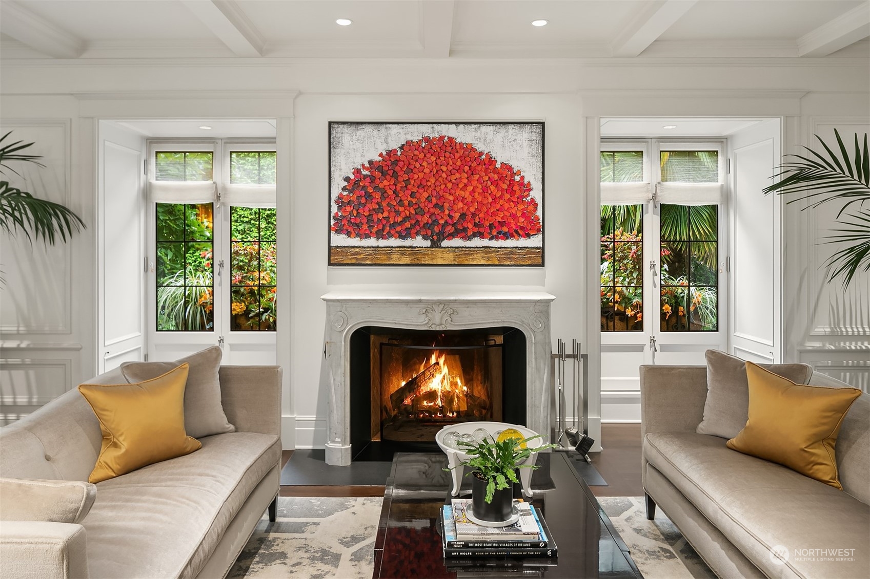 1121 22nd Avenue East Seattle, WA 98112 - Photo 5 of 40 a living room with furniture and a fireplace