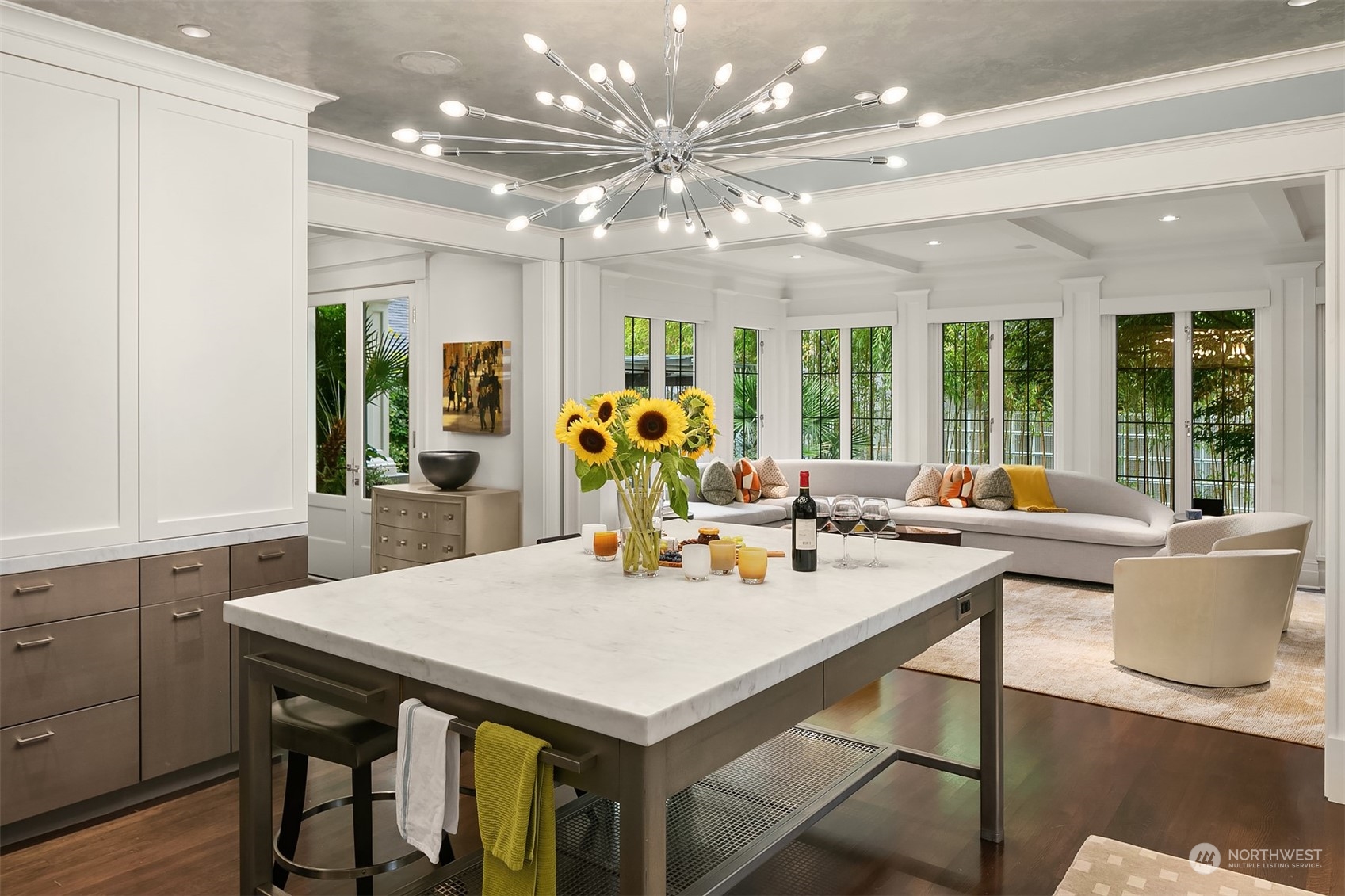 1121 22nd Avenue East Seattle, WA 98112 - Photo 8 of 40 a view of a dining room with furniture and a potted plant