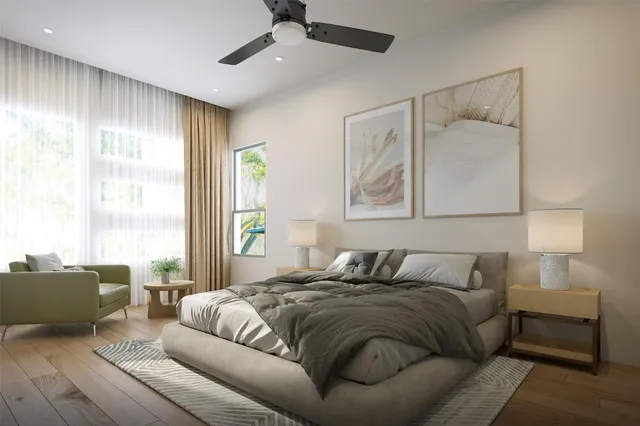 a bedroom with a bed window and couch