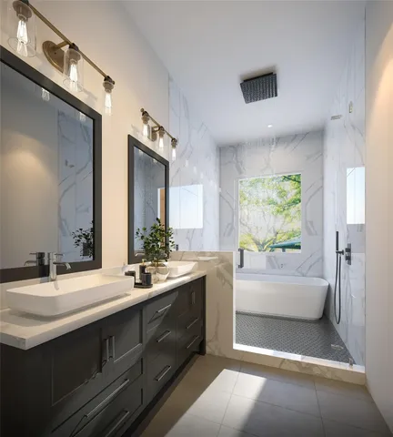 a spacious bathroom with a double vanity sink a mirror and a bathtub