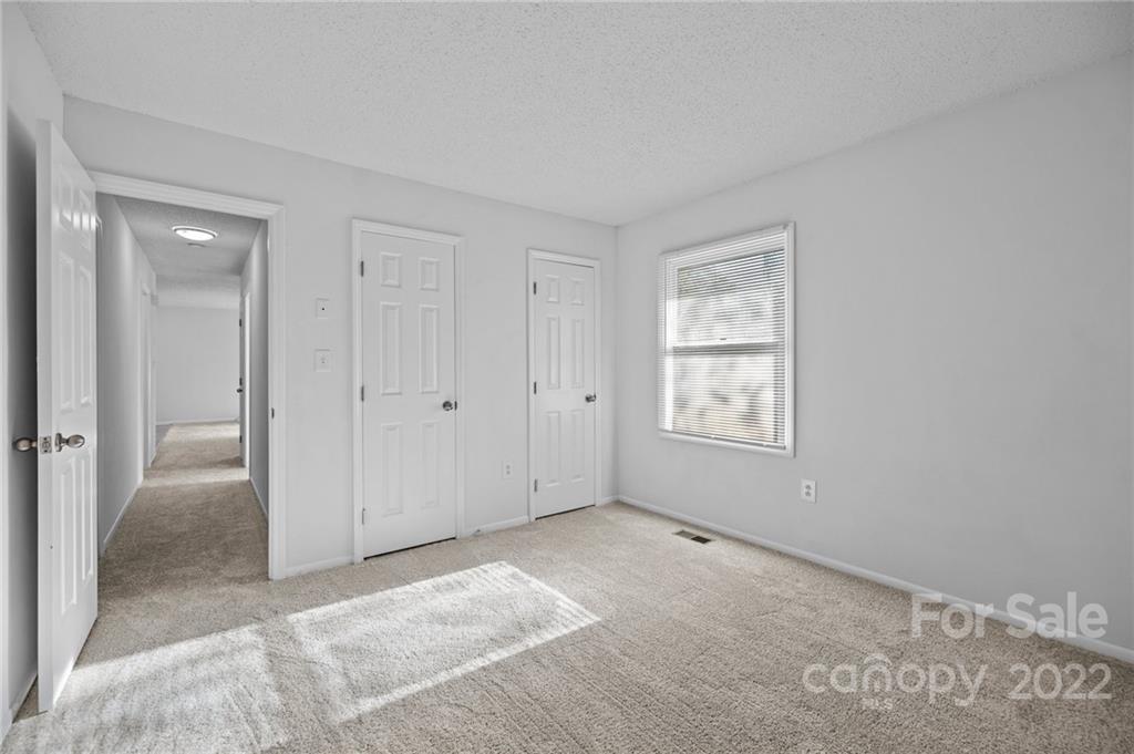 2328 Weddington Road Charlotte, NC 28270 - Photo 19 of 24 a view of an empty room with a window