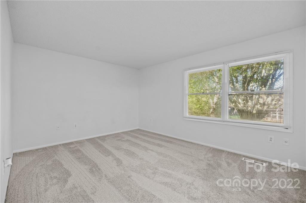 2328 Weddington Road Charlotte, NC 28270 - Photo 20 of 24 an empty room with windows