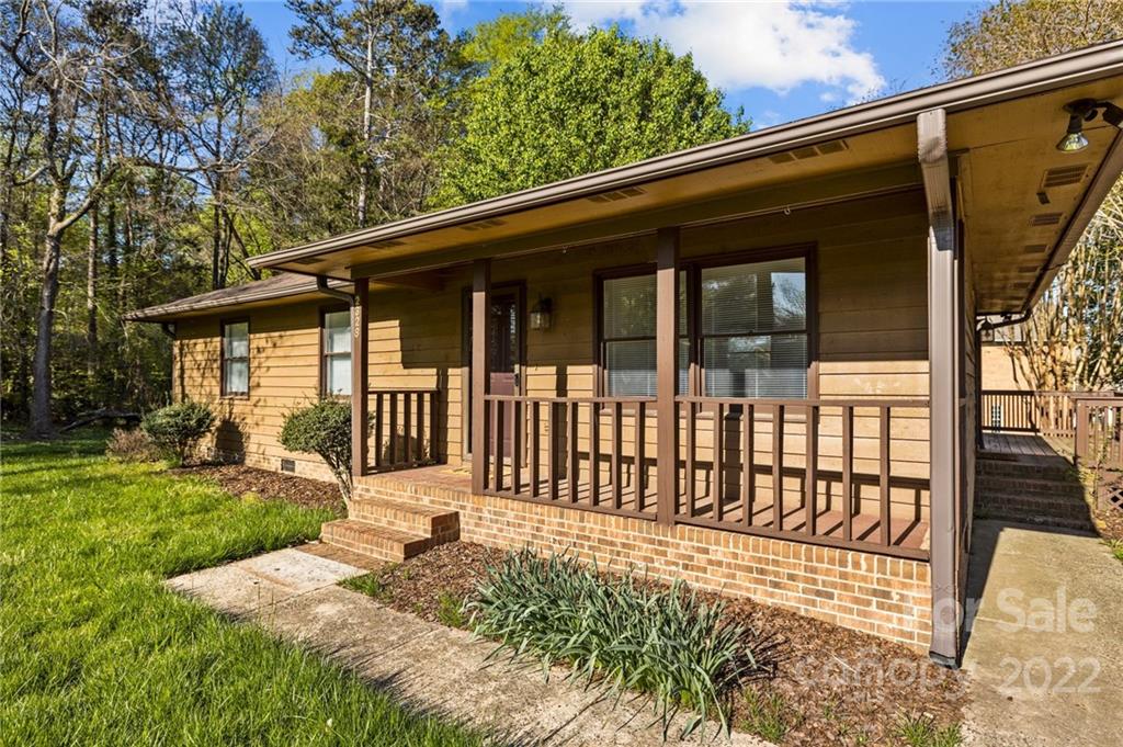2328 Weddington Road Charlotte, NC 28270 - Photo 2 of 24 a view of a house with a yard