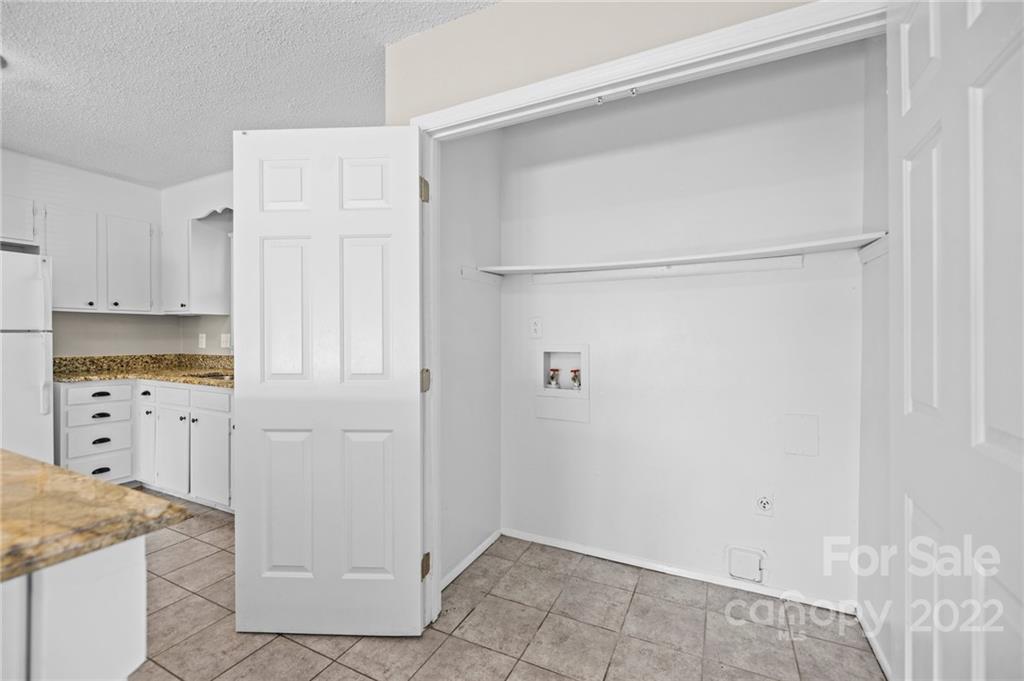 2328 Weddington Road Charlotte, NC 28270 - Photo 24 of 24 a view of kitchen with white cabinets