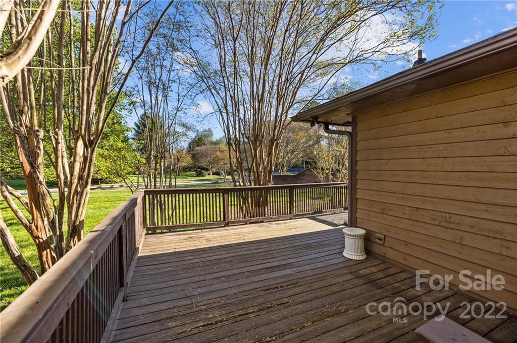 2328 Weddington Road Charlotte, NC 28270 - Photo 3 of 24 a view of a balcony with wooden floor and fence