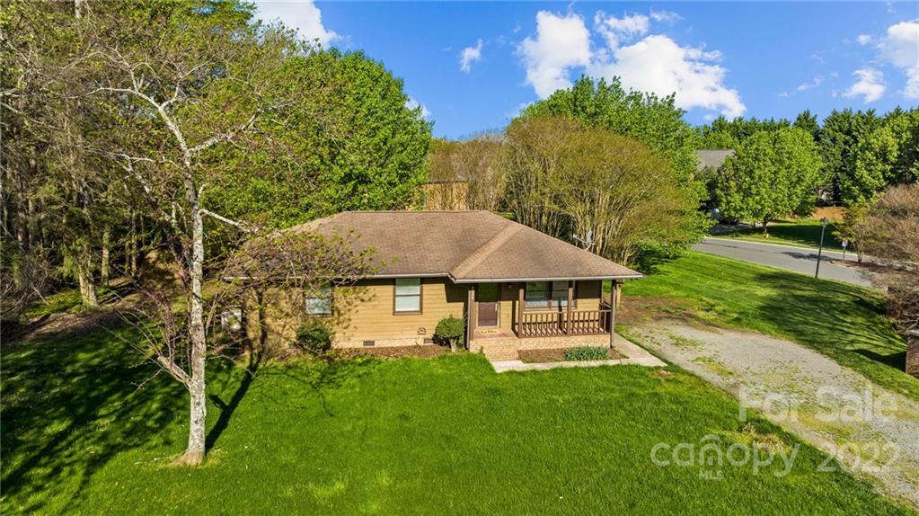 2328 Weddington Road Charlotte, NC 28270 - Photo 6 of 24 a view of a house with a yard