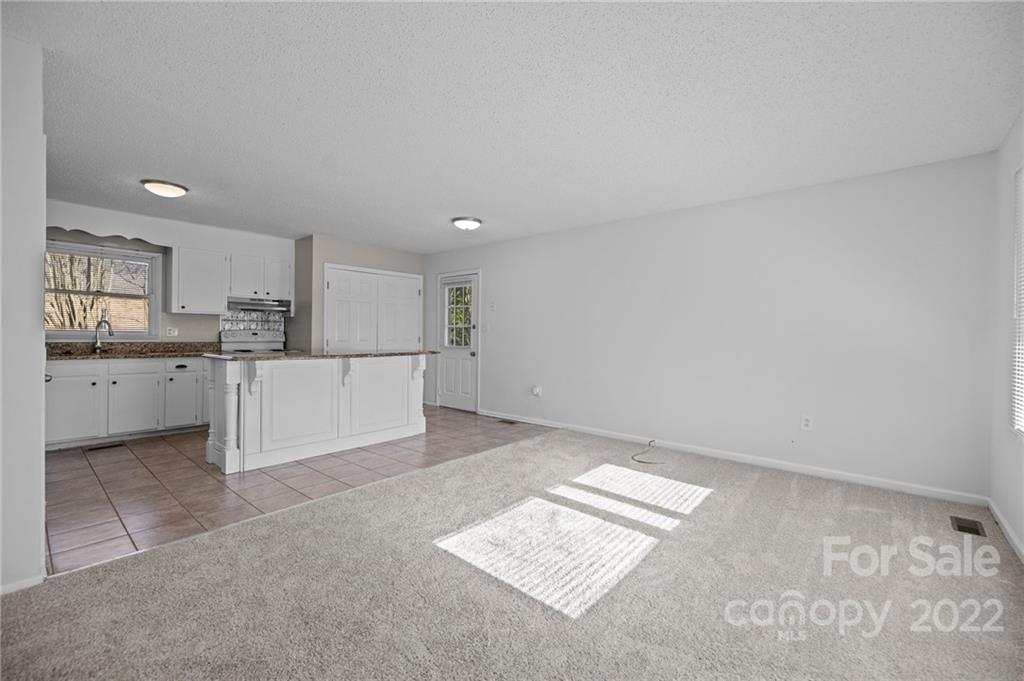 2328 Weddington Road Charlotte, NC 28270 - Photo 8 of 24 a view of a kitchen with a sink