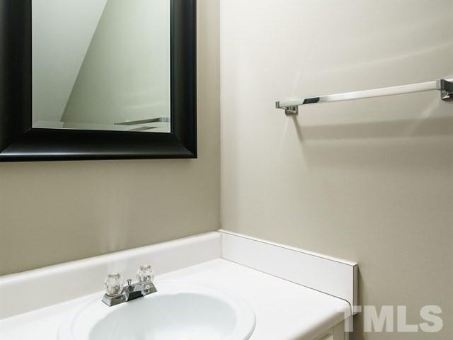 4213 Vienna Crest Drive Raleigh, NC 27613 - Photo 15 of 24 a bathroom with a bathtub