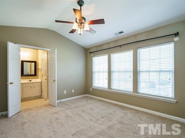 4213 Vienna Crest Drive Raleigh, NC 27613 - Photo 16 of 24 a view of an empty room with a window