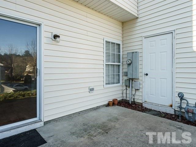 4213 Vienna Crest Drive Raleigh, NC 27613 - Photo 23 of 24 a view of a house with backyard