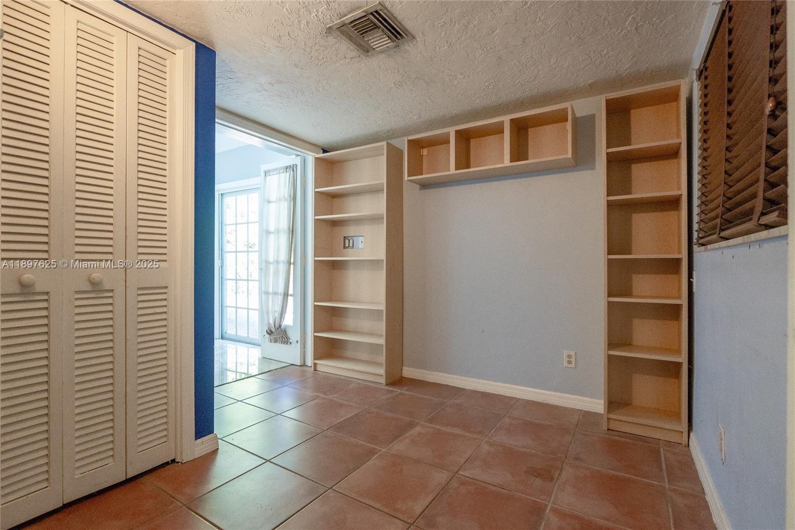 11851 Northwest 7th Street Plantation, FL 33325 - Photo 20 of 72 a view of livingroom with walk in closet and bedroom