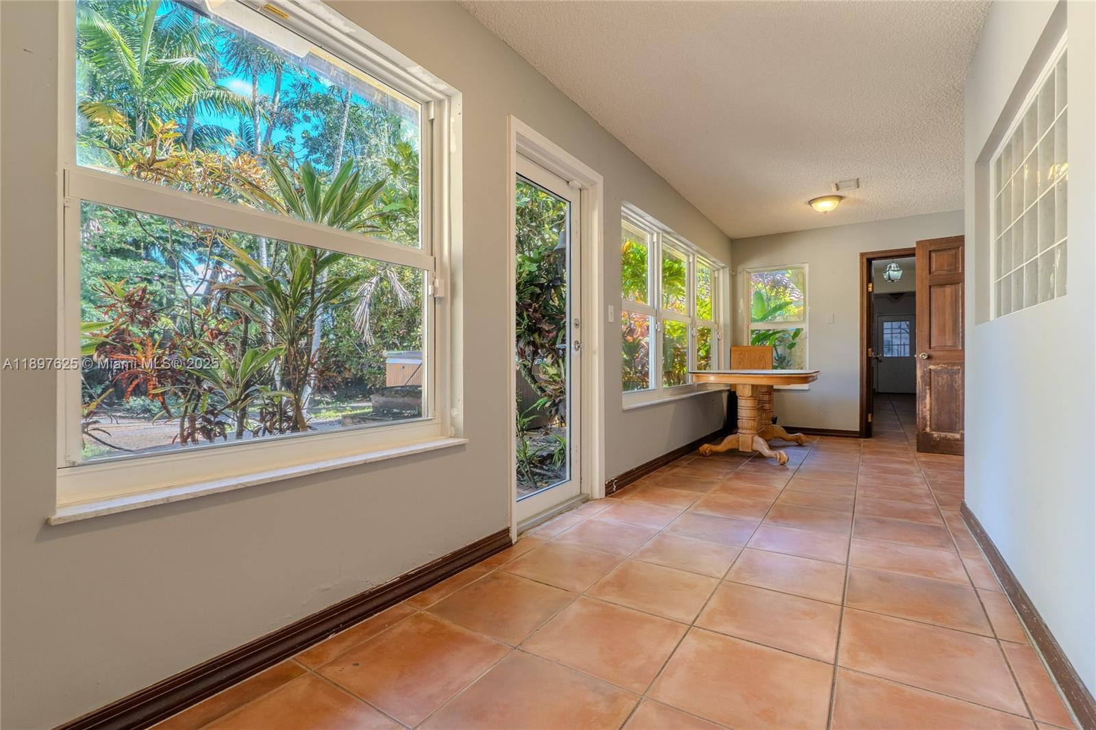 11851 Northwest 7th Street Plantation, FL 33325 - Photo 30 of 72 a view of an empty room with a window