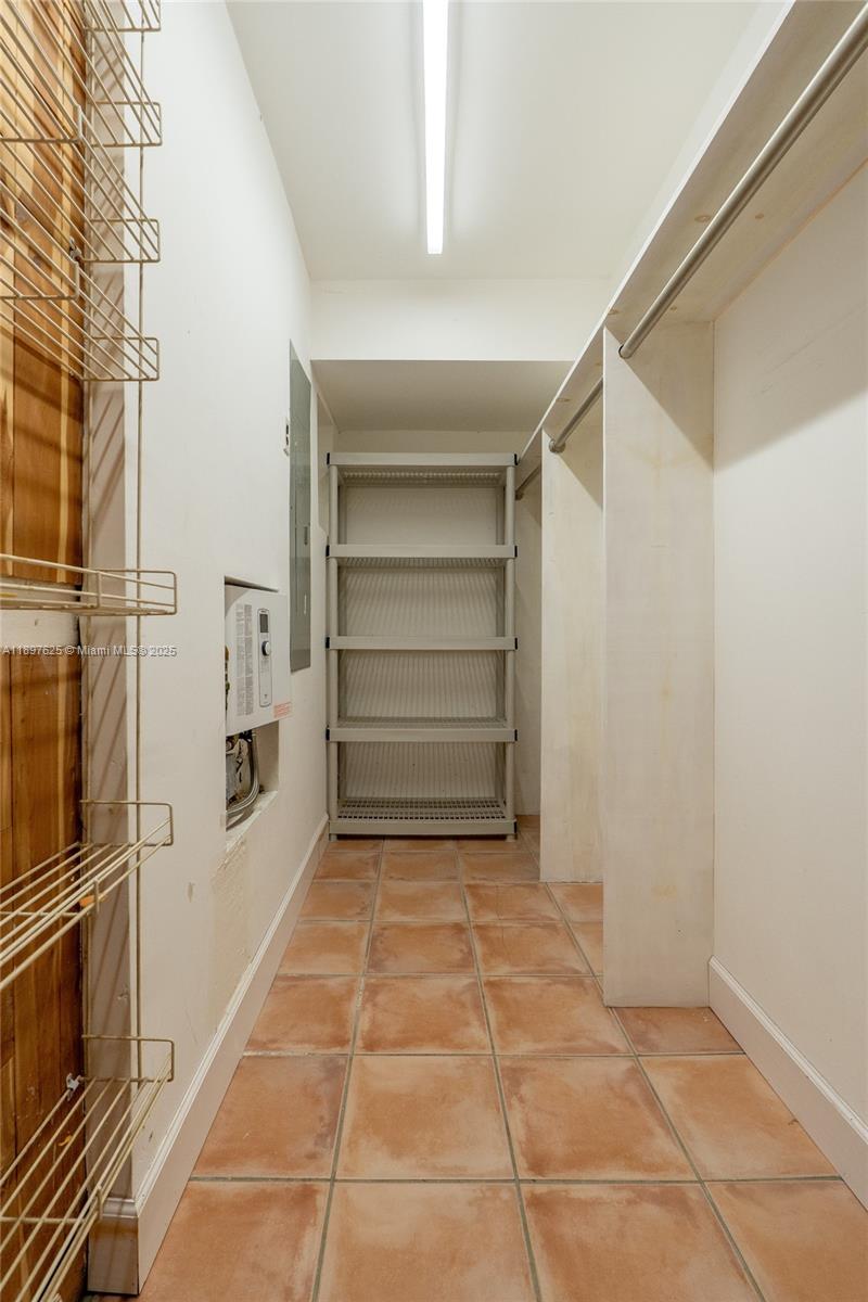 11851 Northwest 7th Street Plantation, FL 33325 - Photo 33 of 72 a room with a stove and a refrigerator