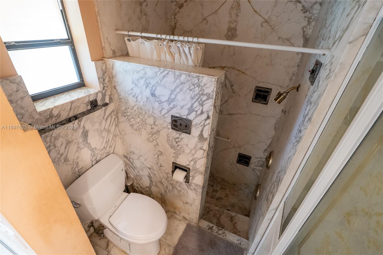 11851 Northwest 7th Street Plantation, FL 33325 - Photo 36 of 72 a bathroom with a toilet and a shower